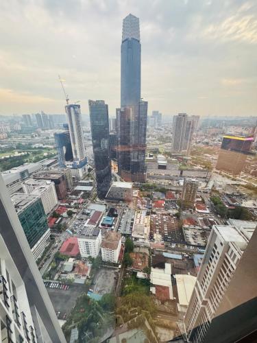 an aerial view of a city with tall buildings at Agile TRX Luxury suite Bukit bintang in Kuala Lumpur