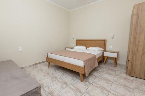 Katil atau katil-katil dalam bilik di olivensun bungalow 1