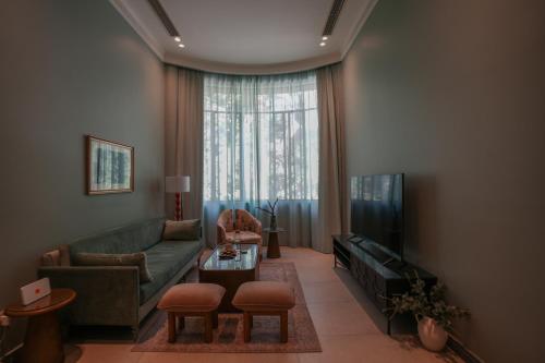 TV a/nebo společenská místnost v ubytování Boutique Residence Villa Atouta-Lemon Spaces Maadi