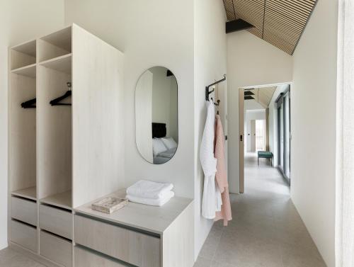 Postel nebo postele na pokoji v ubytování Heiðin Homes Villas