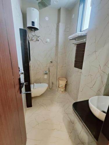Koupelna v ubytování Aanchal Palace Hotel