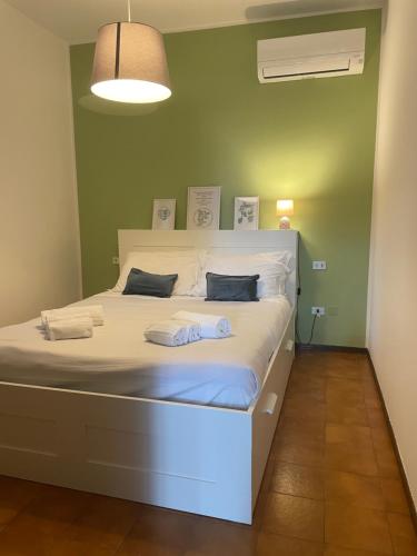 Posteľ alebo postele v izbe v ubytovaní Bnbook - La casa sul Lago Maggiore