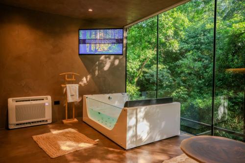 TV a/nebo společenská místnost v ubytování Bregu Village Spa