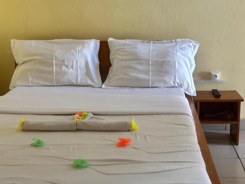 HOTEL MAA MEVFOU Hmmにあるベッド