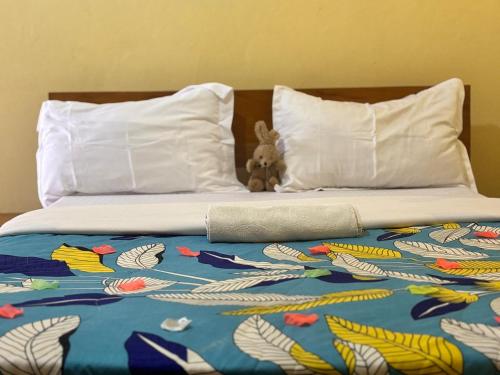 HOTEL MAA MEVFOU Hmmにあるベッド