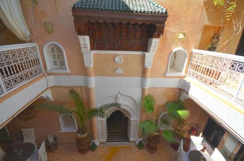 an overhead view of a building with palm trees at Riad Palais Des Princesses & Spa in Marrakesh