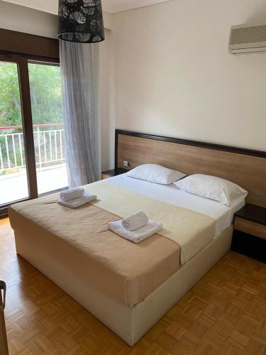 Katil atau katil-katil dalam bilik di Nickolas Sea View Apartment