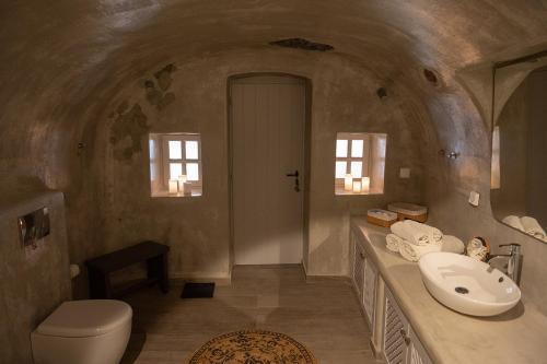 a bathroom with a sink and a toilet at The Wine Nest in Megalokhori