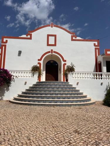 a group of stairs in front of a building at Villa Madeira in Silves