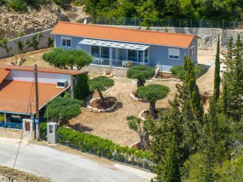 an aerial view of a house with a garden at Foki Beach House in Fiskardho