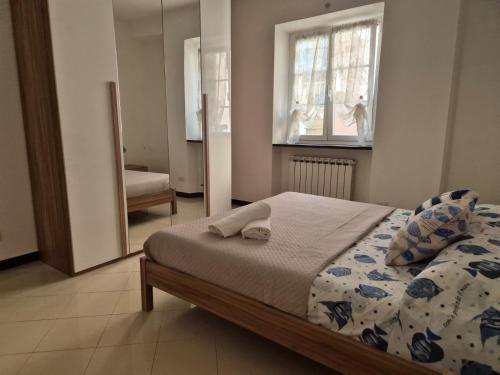 Ένα ή περισσότερα κρεβάτια σε δωμάτιο στο Da Gio' e Eli