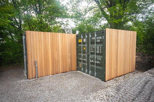 a pair of wooden doors with lockers in a field at St Michaels Lodge in Richmond