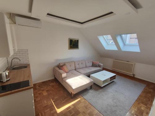 a living room with a couch and a table at No work in Ivišovo Greblje