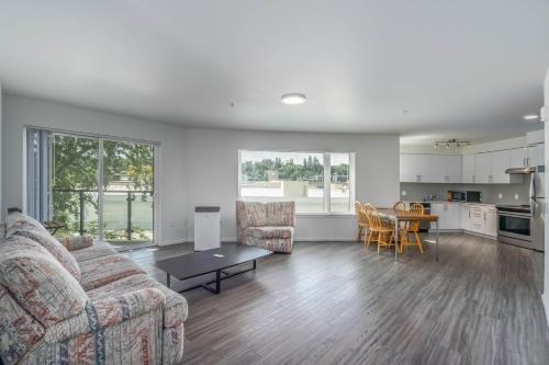 a living room with a couch and a table at U Place Urban Apartments by Sweetome in Seattle