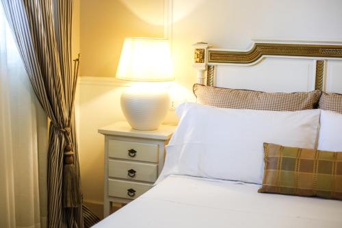 Postel nebo postele na pokoji v ubytování B&B Le Bianche