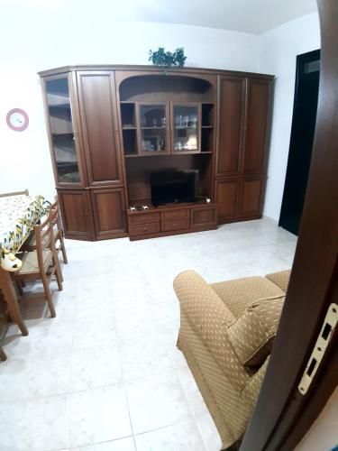 Ruang duduk di La casa nel borgo, in a cozy charming village, 15 min to Beach, Small pets welcome