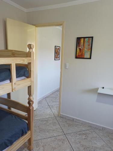 Katil atau katil-katil dalam bilik di Apartamento 3 Ótima Localização