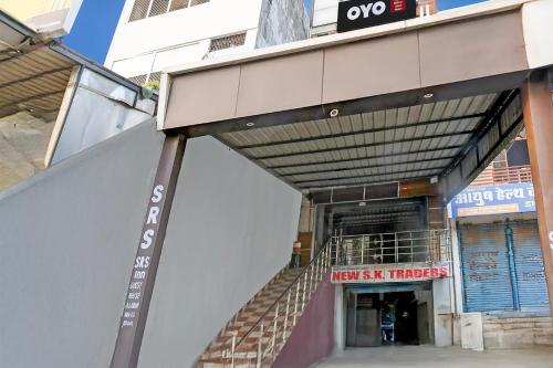 a building with a stairway leading to a next exit at Hotel O SRS Inn Guest House in Gorakhpur