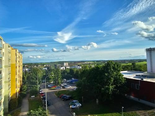 a view of a parking lot in a city at Sun Prague - Stodůlky in Prague