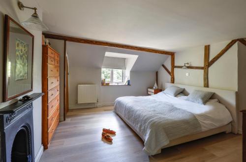 Postel nebo postele na pokoji v ubytování Honeybridge House