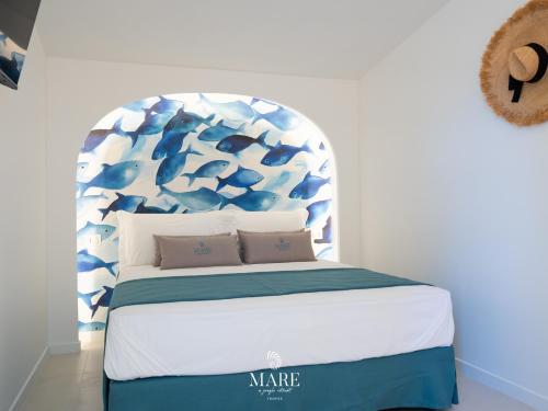 Ένα ή περισσότερα κρεβάτια σε δωμάτιο στο MARE TROPEA - A Jungle Retreat