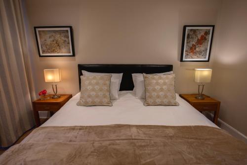 Ένα ή περισσότερα κρεβάτια σε δωμάτιο στο Kaniek - Guest Suite