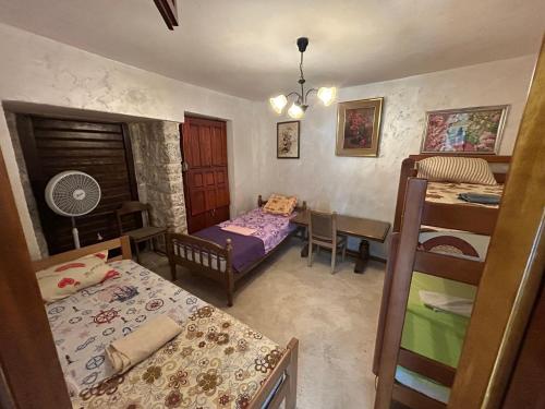 Postel nebo postele na pokoji v ubytování Michel Guesthouse