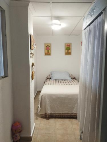 Ένα ή περισσότερα κρεβάτια σε δωμάτιο στο Santa Pola