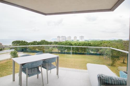 a view from the balcony of a house with a table and chairs at Hotel Residence Imperial in Misano Adriatico