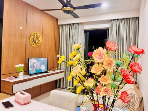 Télévision ou salle de divertissement dans l'établissement Sky Homestay Huế