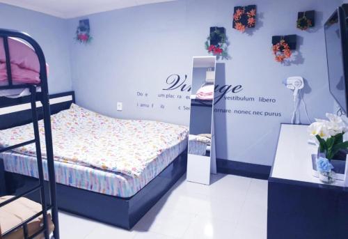 Кровать или кровати в номере Dreaming Hostel Sinchon Hongdae