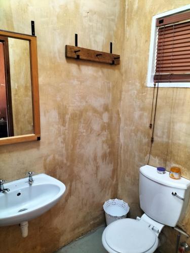 Ein Badezimmer in der Unterkunft Cango's Rest