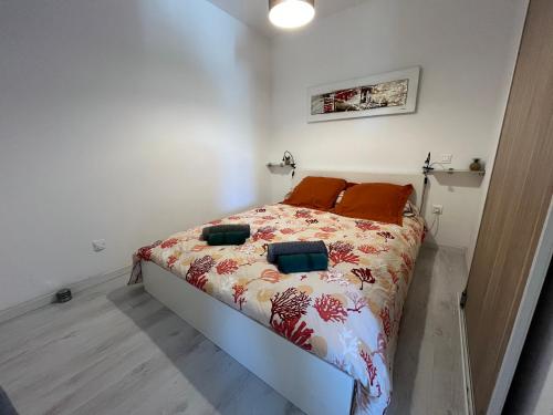 Postel nebo postele na pokoji v ubytování Appartement vue mer imprenable.