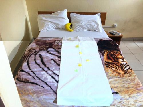 HOTEL MAA MEVFOU Hmmにあるベッド