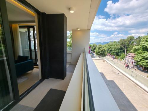 a view from the balcony of a building at Apartmani Zepterme by CENTRAL in Vrnjačka Banja