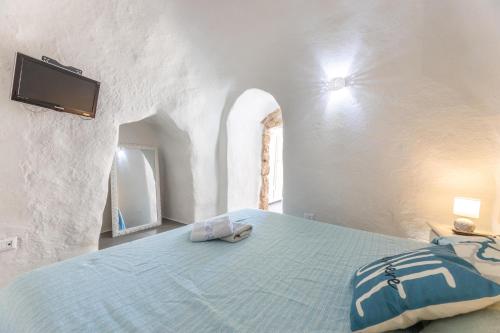 Ένα ή περισσότερα κρεβάτια σε δωμάτιο στο Villa Dama