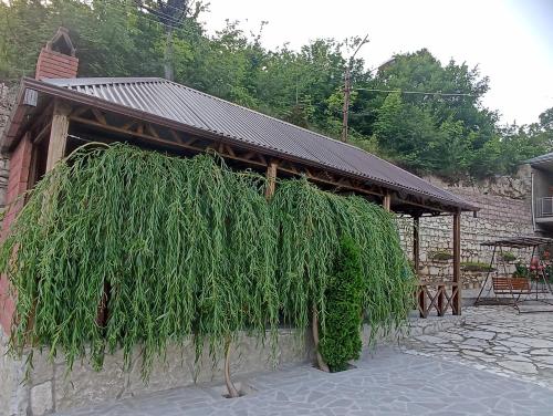 a large pile of grass on the side of a building at Green Garden in Ijevan