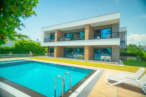 Бассейн в Sweet Home Kemer Apartments или поблизости