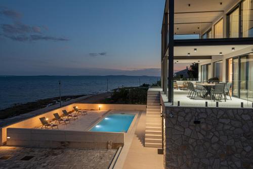 Luxury Seafront Villa Aurea - with private Pool, Game Room & Stunning Sea Views