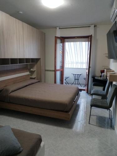 Postel nebo postele na pokoji v ubytování RIU b&b ALGHERO
