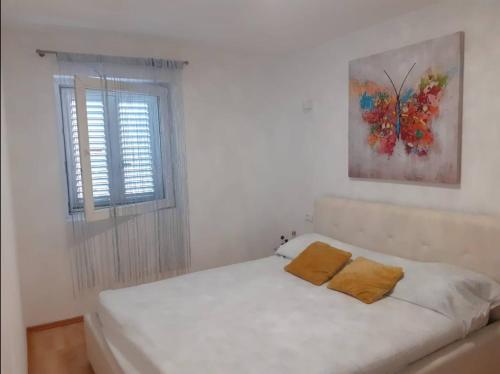 Posteľ alebo postele v izbe v ubytovaní Toni Apartment
