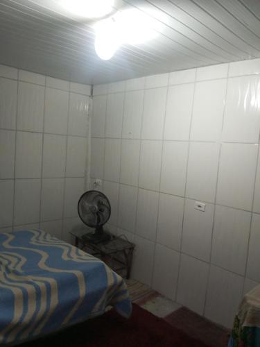 Ένα ή περισσότερα κρεβάτια σε δωμάτιο στο Cirlene e Lyncon