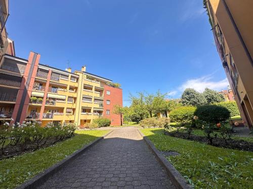 a walkway in front of a building at Curiel in Rozzano