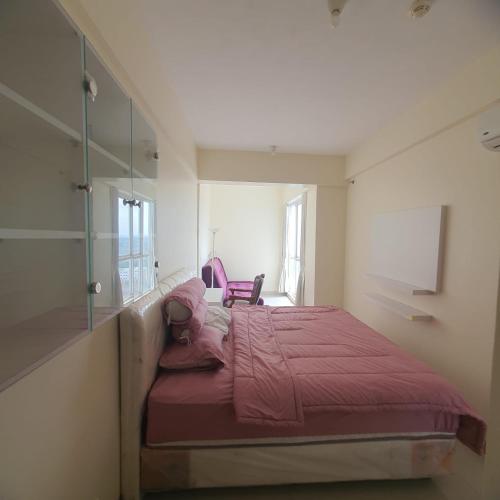 Ένα ή περισσότερα κρεβάτια σε δωμάτιο στο Two Bedrooms Flat Rent in Depok