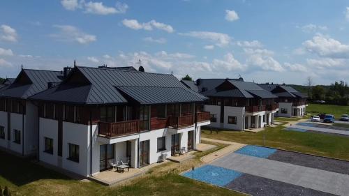 an overhead view of a row of houses at Apartamenty Pastelove Nałęczów in Nałęczów
