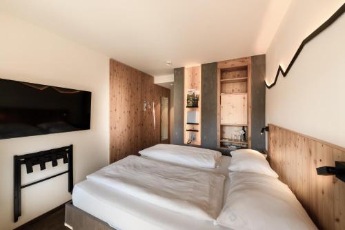 Una cama o camas en una habitación de Dips&Drops - Hotel Superior