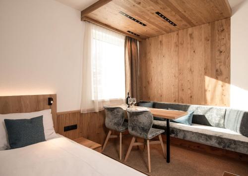 Una cama o camas en una habitación de Dips&Drops - Hotel Superior