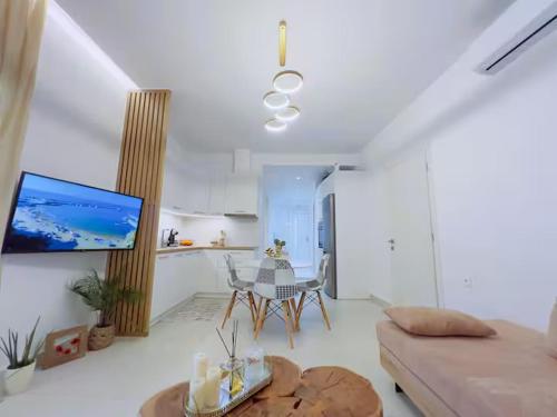 Luma - Beachfront Apartmentにあるテレビまたはエンターテインメントセンター