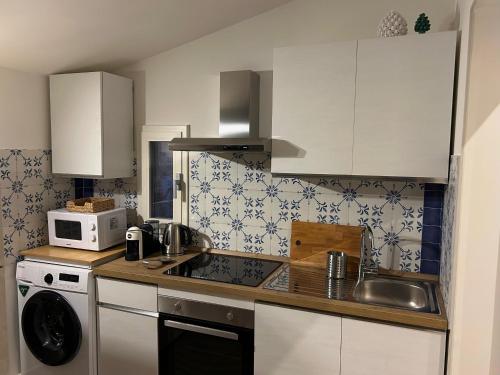 Kuchyň nebo kuchyňský kout v ubytování Casa Sirokos