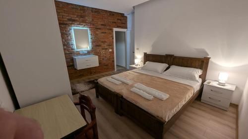 Ένα ή περισσότερα κρεβάτια σε δωμάτιο στο The Parkside Villa Apartment I